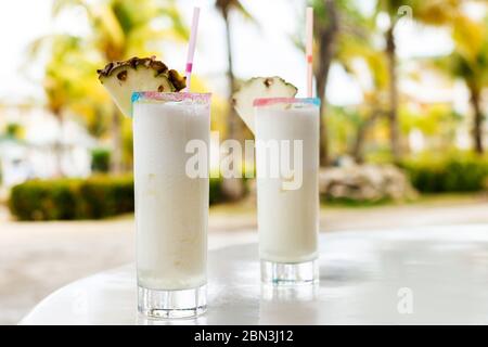 Two glasses of  Pina colada cocktail on the table Stock Photo
