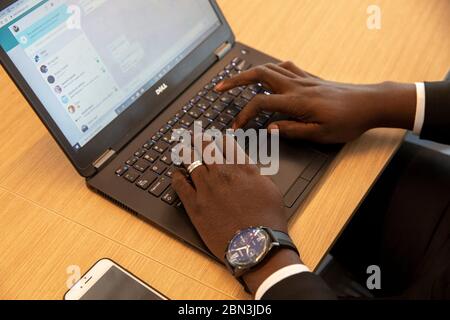 African man working using a laptop in Cacablanca, Morocco. Stock Photo