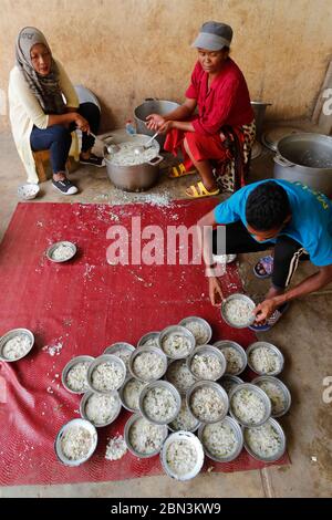 Free food distribution for street children.  Antananarivo. Madagascar. Stock Photo