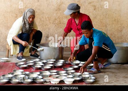 Free food distribution for street children.  Antananarivo. Madagascar. Stock Photo