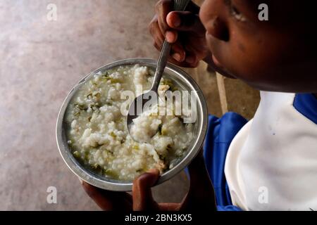 Free food distribution for street children.  Antananarivo. Madagascar. Stock Photo