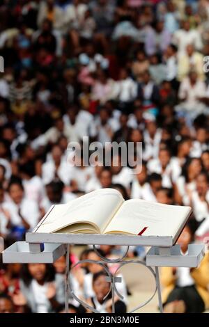 Sunday catholic mass with the Akamasoa Community of Good Friends.  Mass book.  Antananarivo. Madagascar. Stock Photo