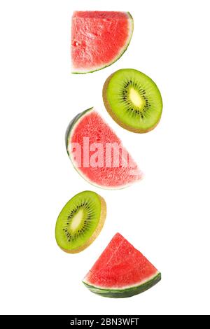Floating watermelon and kiwi fruit isolated on white Stock Photo