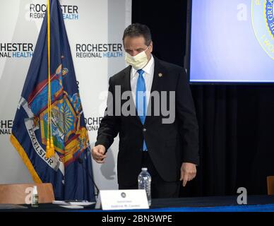 (200512) -- IRONDEQUOIT, May 12, 2020 (Xinhua) -- Governor Andrew M. Cuomo arrives for a press conference in Irondequoit of New York State, the United States, May 11, 2020. The U.S. state of New York will end its statewide closure on May 15 by reopening three regions where the COVID-19 pandemic has shown signs of mitigation, Governor Andrew Cuomo said Monday. Cuomo said three regions in the northern part of the state -- the Southern Tier, Mohawk Valley, and the Finger Lakes -- have met the criteria for reopening and will enter the first of four reopening phases. (Mike Groll/Office of Governor Stock Photo