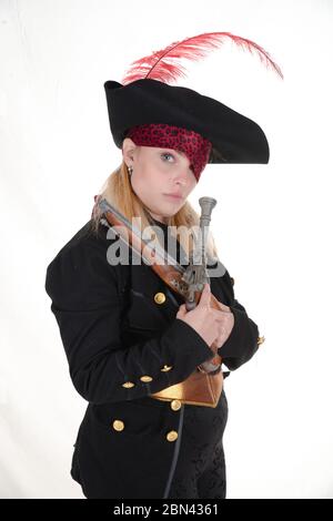 carribean girl pirate in the black background look the camera Stock Photo