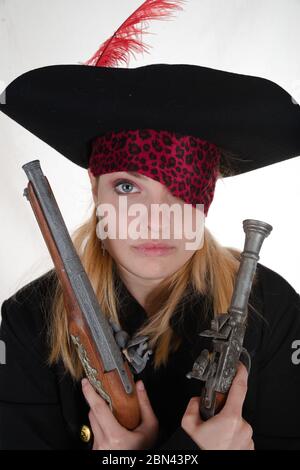 carribean girl pirate in the black background look the camera Stock Photo