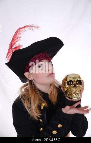 carribean girl pirate in the black background look the camera Stock Photo