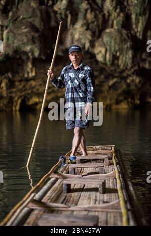 A boatman at the inside the Tham Lot cave, Pang Mapha,  Pai, Thailand. Stock Photo