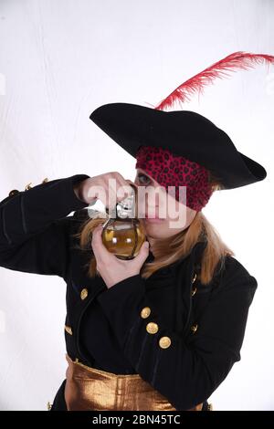 carribean girl pirate in the black background look the camera Stock Photo