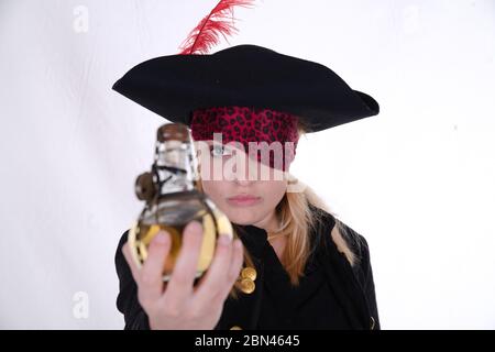 carribean girl pirate in the black background look the camera Stock Photo