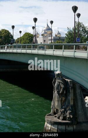 Pont de l'Alma with the Zouave statue the informal flood marker of River Seine and Eiffel Tower in the background.Paris.France Stock Photo