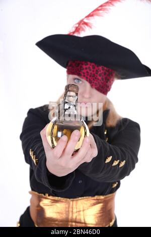 carribean girl pirate in the black background look the camera Stock Photo