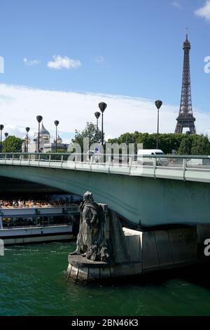 Pont de l'Alma with the Zouave statue the informal flood marker of River Seine and Eiffel Tower in the background.Paris.France Stock Photo