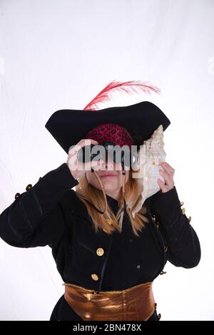 carribean girl pirate in the black background look the camera Stock Photo