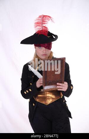 carribean girl pirate in the black background look the camera Stock Photo