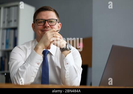 Cheerful man in presentable suit Stock Photo