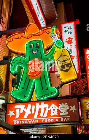 Naha, Okinawa / Japan - February 26, 2018: Neon sign advertising Okinawan food and bar in Naha, Okinawa, Japan Stock Photo