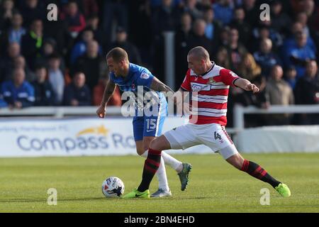 HARTLEPOOL, ENGLAND - Lewis Alessandra of Hartlepool United and Luke McCullough of Doncaster Rovers during the SKY Bet League 2 match between Hartlepool United and Doncaster Rovers at Victoria Park, Hartlepool on Saturday 6th May 2017 (Credit: Mark Fletcher | MI News) Stock Photo