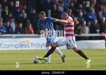 HARTLEPOOL, ENGLAND - Lewis Alessandra of Hartlepool United and Luke McCullough of Doncaster Rovers during the SKY Bet League 2 match between Hartlepool United and Doncaster Rovers at Victoria Park, Hartlepool on Saturday 6th May 2017 (Credit: Mark Fletcher | MI News) Stock Photo