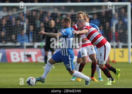 HARTLEPOOL, ENGLAND - Lewis Alessandra of Hartlepool United and Luke McCullough of Doncaster Rovers during the SKY Bet League 2 match between Hartlepool United and Doncaster Rovers at Victoria Park, Hartlepool on Saturday 6th May 2017 (Credit: Mark Fletcher | MI News) Stock Photo