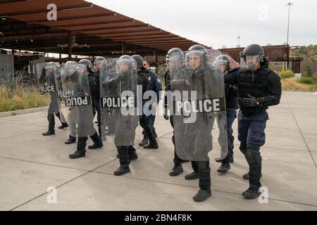 Mobile Field Force officers from the Office of Field Operations train for potential protests at the Port of Nogales, AZ, Mariposa Crossing on October 30, 2018. Stock Photo