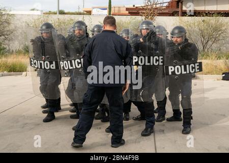 Mobile Field Force officers from the Office of Field Operations train for potential protests at the Port of Nogales, AZ, Mariposa Crossing on October 30, 2018. Stock Photo