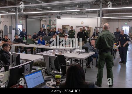 CBP Deputy Commissioner Robert Perez visited the Otay Mesa Port of Entry . During his visit the  Deputy Commissioner was briefed on port hardening operations at the import/export facilities and passenger processing facility. Other CBP participants included San Diego Field Office Director of Field Operations Pete Flores, San Diego Deputy Director of Field Operations Anne Maricich, Otay Mesa Port Director Rasa Hernandez, Assistant Port Director Joseph Misenhelter, Assistant Port Director Charmaine Rodriguez, Assistant Port Director Carlos Silva. Stock Photo