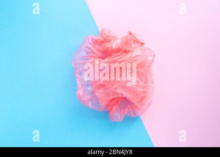 Flatlay crumpled plastic bag. Non-decaying trash. Environmental pollution concept. Ecology and separate sorting of trash. Top view. Stock Photo