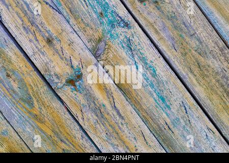 Faded old paint on the wooden boards. Stock Photo
