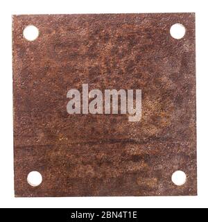 Rusty metal plate with four holes for fastening isolated on a white background Stock Photo