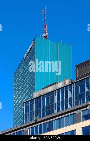 Warsaw, Mazovia / Poland - 2020/05/10: North Gate office tower building at 17 Bonifraterska street in Srodmiescie district of Warsaw, with Intraco I t Stock Photo