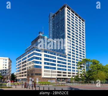 Warsaw, Mazovia / Poland - 2020/05/10: North Gate office tower building, known also as Belvedere Centrum, at 17 Bonifraterska street in Srodmiescie di Stock Photo