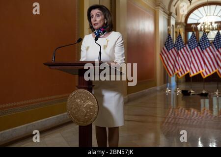 Speaker of the United States House of Representatives Nancy Pelosi (Democrat of California) delivers a statement on Capitol Hill, in Washington, DC, Tuesday, May 12, 2020, on the Heroes Act aid package introduced by House democrats. The legislation provides nearly $1 trillion for states and cities, and 'hazard pay' for essential workers affected by the Coronavirus pandemic.Credit: Graeme Jennings/CNP /MediaPunch Stock Photo