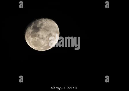 Beautiful photo of the full moon in close up with dark sky in the background Stock Photo