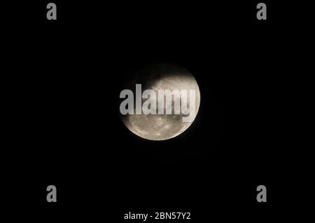 Beautiful photo of the crescent moon in close up with dark sky in the background. Stock Photo