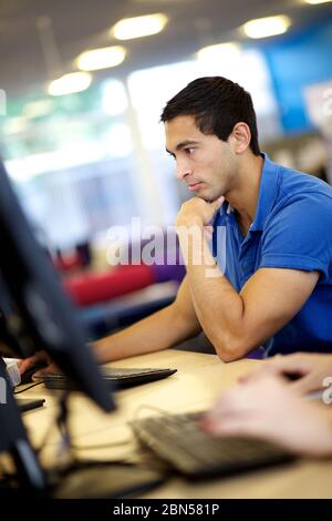 Male student working on laptop, Stock Photo