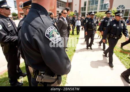 Austin, Texas USA, April 12 2012:: Thousands of police officers pay tribune to Austin police officer Jaime Padron, killed in the line of duty, at his funeral.  ©Marjorie Kamys Cotera/ Daemmrich Photography Stock Photo