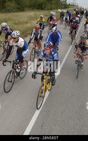 Austin, Texas USA, October 26, 2003: Five-time Tour de France winner Lance Armstrong leads a pack of elite riders on a 40-mile trek during the Lance Armstrong Foundation's Ride for the Roses benefitting cancer research. Thousands of riders from around the U.S. rode with Armstrong during three days of events. ©Bob Daemmrich Stock Photo