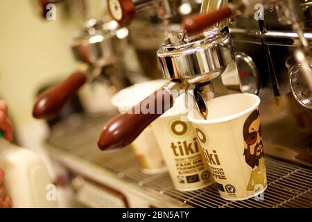 Espresso Machine Pouring Coffee In Two Shot Glass Stock Photo