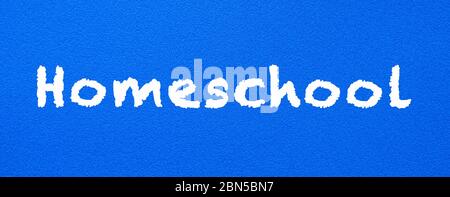 Homeschool. Words or typed text on blue board. Education concept. Stock Photo