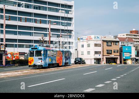 Kochi, Shikoku, Japan - April 20, 2019 : City Tram in downtown Stock Photo