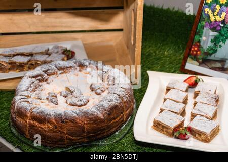 Easter sweet bread Orthodox kulich, paska, rustic wooden background. Easter Holidays breakfast. Space for text. Stock Photo