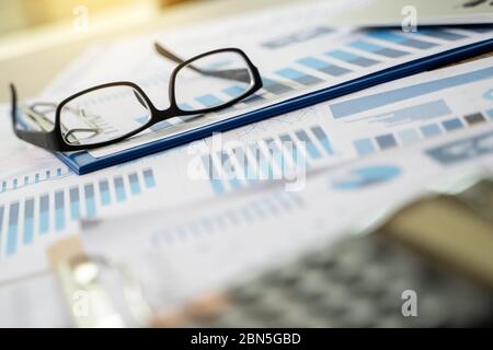 Financial Report- Business Accounting working and analyzing financial documents Analytics Statistics Information Business Technology. Stock Photo