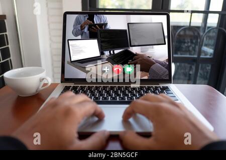 Online Group Videoconference On Laptop video call with teacher on computer, learning online from home videoconference application chat communicate Stock Photo