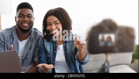 Happy Black Couple Recording Video For Their Relationship Blog In Internet Stock Photo