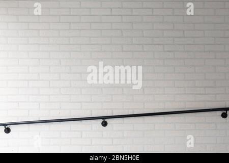 Modern architecture. White brick wall and handrail Stock Photo