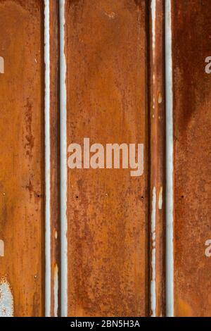 Red brown rusty metal plate wall texture background Stock Photo