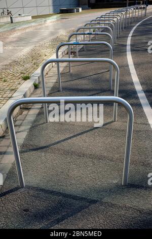 Empty bicycle racks in front of German National Library, curfew due to coronavirus, Leipzig, Saxony, Germany Stock Photo