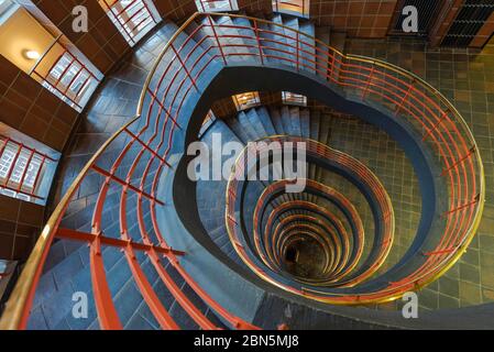 Spiral staircase from above, Sprinkenhof, interior view, Kontorhausviertel, Hamburg, Germany Stock Photo