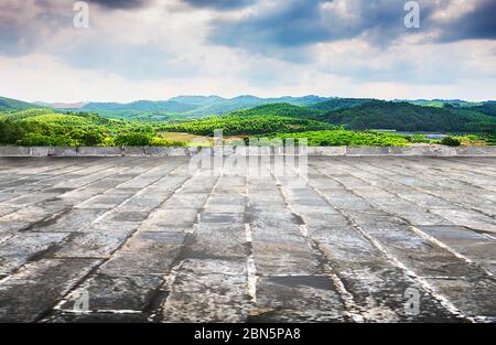 Unmanned blue brick pavement and peaceful mountain village natural landscape. Stock Photo